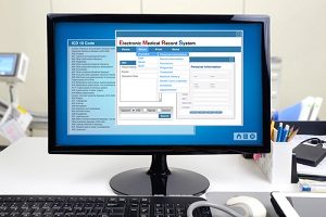 Computer screen showing electronic medical records system with ICD 10 codes