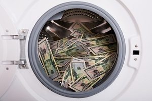 Currency in laundry machine
