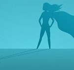 female standing proud with her silhouette as a superhero