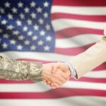 Military Personnel and Businessman Shaking Hands
