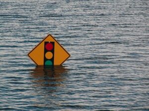 Flooded Traffic Light Sign