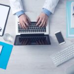 Medical professional at computer